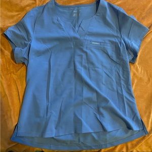 Jaanuu women’s 3 pocket scrub top